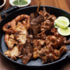 Mix de achuras - chinchulines, mollejas, anticucho